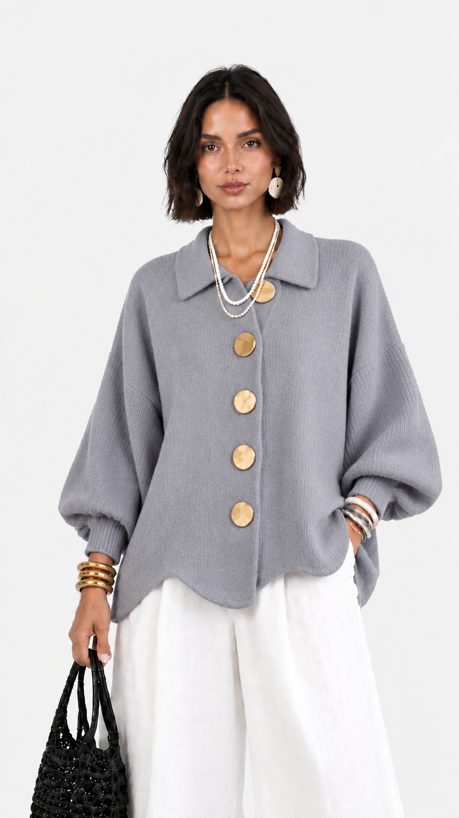 Carlota | Chaqueta de punto cuello polo manga abullonada bajo ondulado