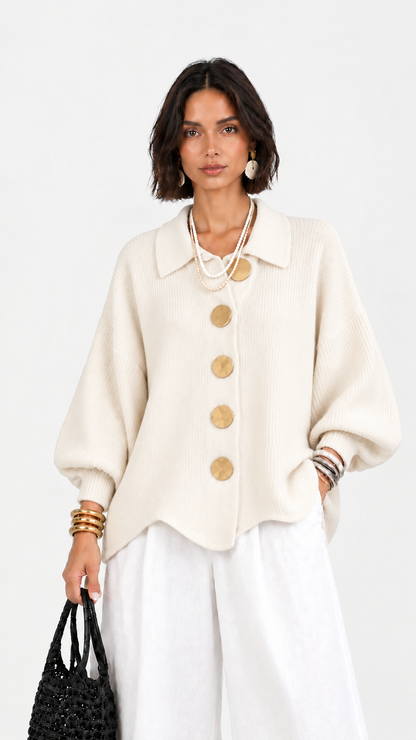 Carlota | Chaqueta de punto cuello polo manga abullonada bajo ondulado