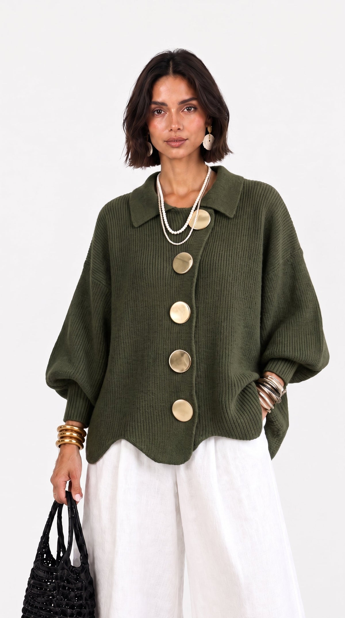 Carlota | Chaqueta de punto cuello polo manga abullonada bajo ondulado