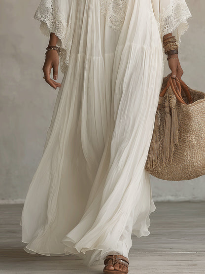 Vestido largo de gasa color marfil con mangas de murciélago y encaje blanco Adelaida