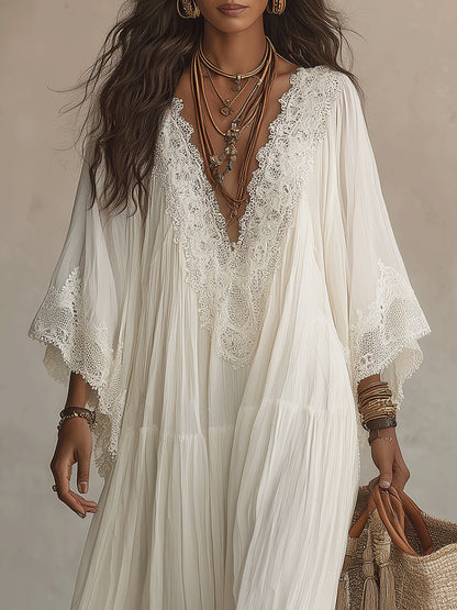Vestido largo de gasa color marfil con mangas de murciélago y encaje blanco Adelaida